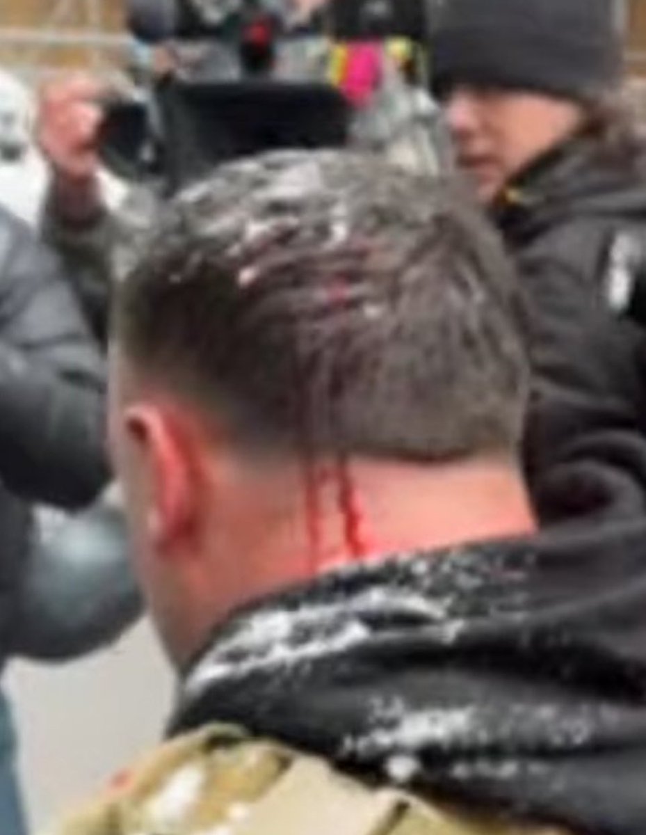 Me, in background, filming Jake Lang in Minneapolis today