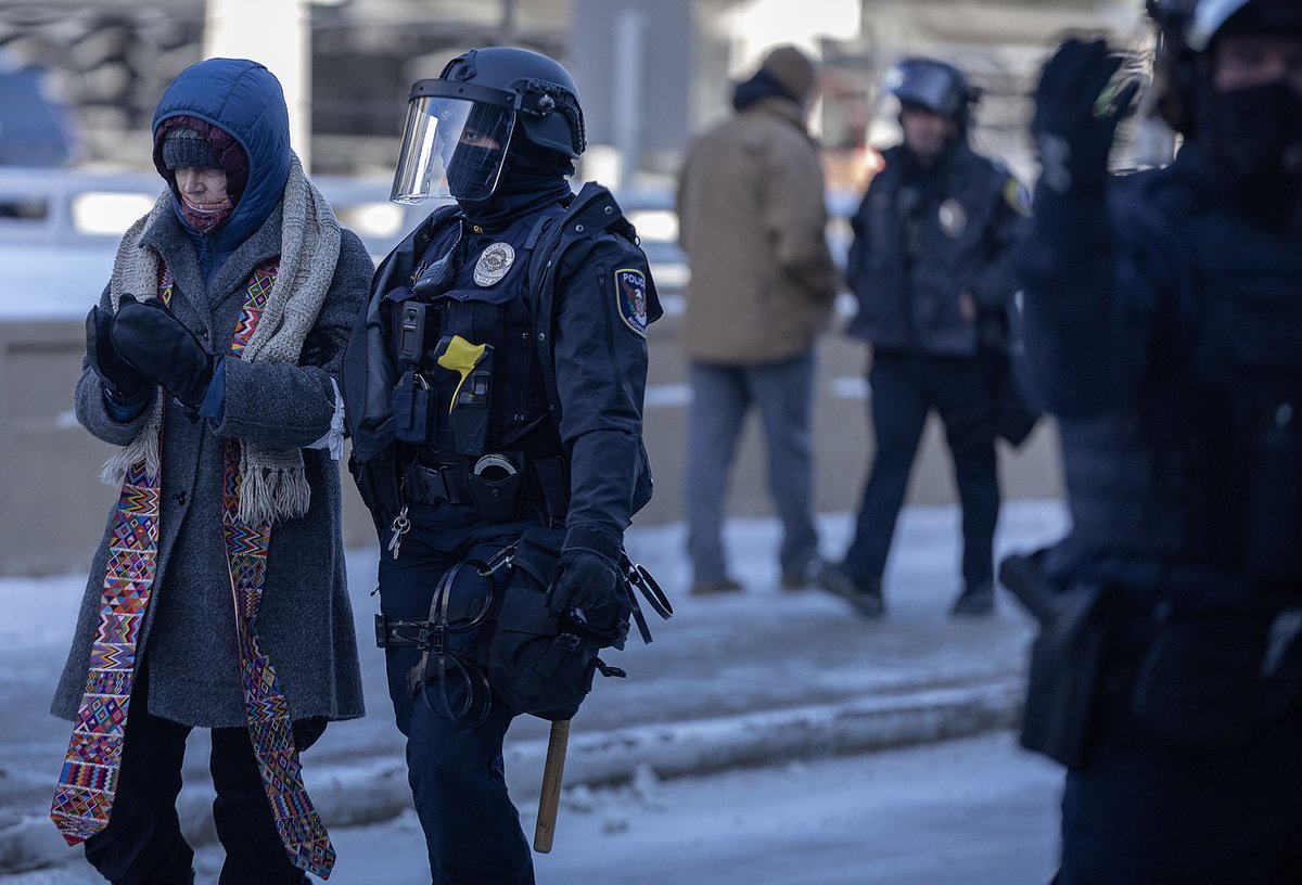 Following a morning demonstration outside Minneapolis–St. Paul International Airport's main terminal, a Metropolitan Airports Commission spokesman said police arrested roughly 100 demonstrators.