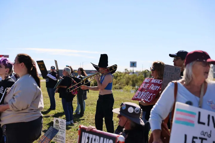 Protestors have begun to gather outside of Heartland Credit Union Arena in Park City ahead of President Trump's arrival